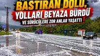 Kars'ta aniden bastıran dolu, yolları beyaza bürüdü ve sürücülere zor anlar yaşattı