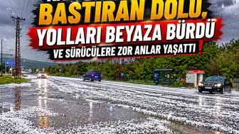 Kars'ta aniden bastıran dolu, yolları beyaza bürüdü ve sürücülere zor anlar yaşattı